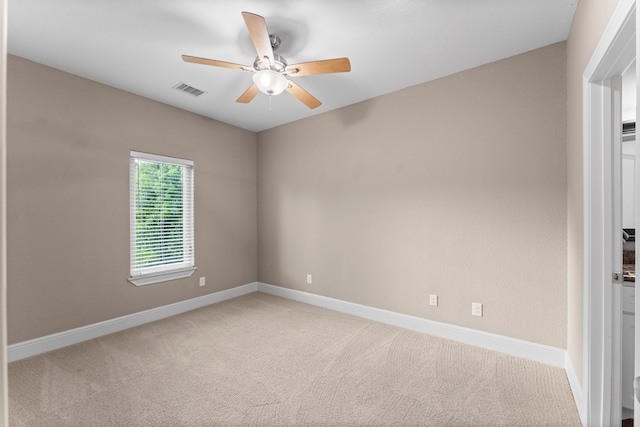 127 Benjis Pl, The Woodlands, TX 77380 - carpeted spare room featuring a ceiling fan and baseboards