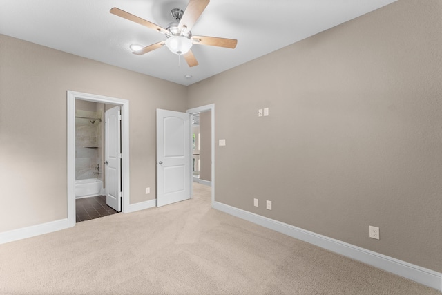 127 Benjis Pl, The Woodlands, TX 77380 - unfurnished bedroom with carpet, a ceiling fan, and ensuite bathroom