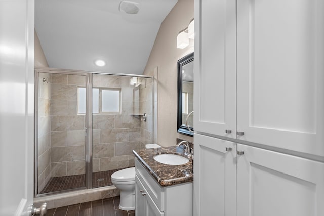 127 Benjis Pl, The Woodlands, TX 77380 - full bath featuring vanity, vaulted ceiling, and a shower stall
