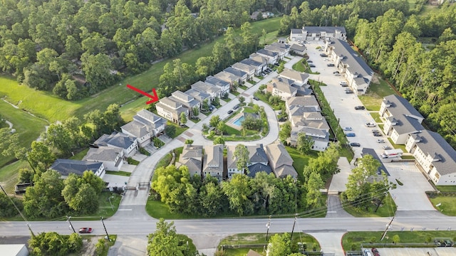 127 Benjis Pl, The Woodlands, TX 77380 - aerial overview of property's location with nearby suburban area