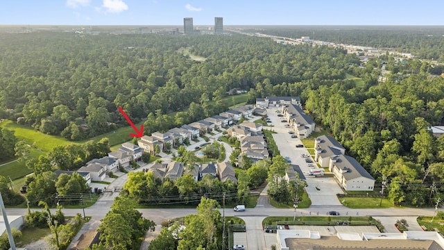 127 Benjis Pl, The Woodlands, TX 77380 - aerial view of residential area with a heavily wooded area