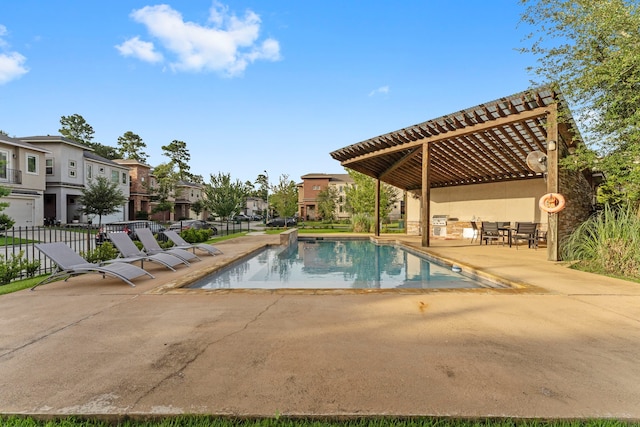 127 Benjis Pl, The Woodlands, TX 77380 - community pool featuring a pergola, a patio, and a residential view