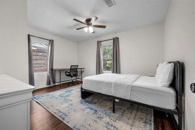 5413 Bataan Rd, Houston, TX 77033 - bedroom featuring dark wood-style flooring and ceiling fan