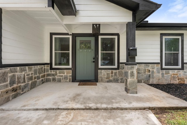 5413 Bataan Rd, Houston, TX 77033 - property entrance featuring stone siding