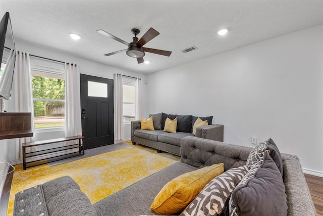 5413 Bataan Rd, Houston, TX 77033 - living area with recessed lighting, a ceiling fan, and wood finished floors