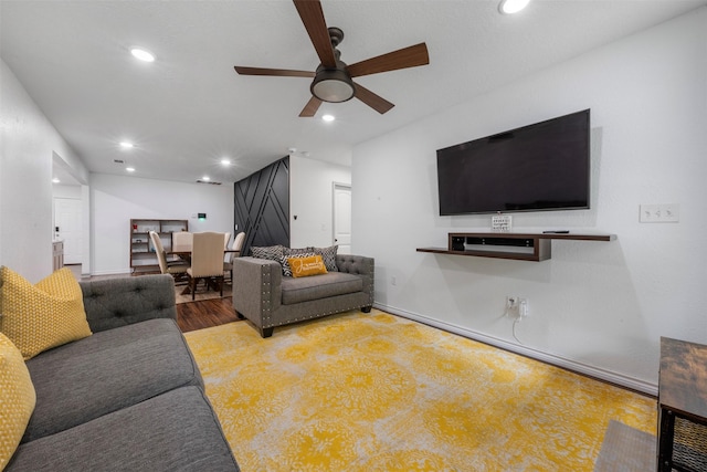 5413 Bataan Rd, Houston, TX 77033 - living room with ceiling fan, recessed lighting, and wood finished floors