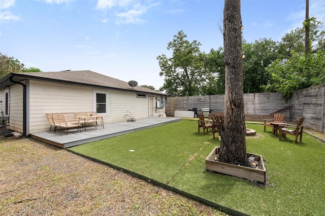 5413 Bataan Rd, Houston, TX 77033 - fenced backyard with a deck