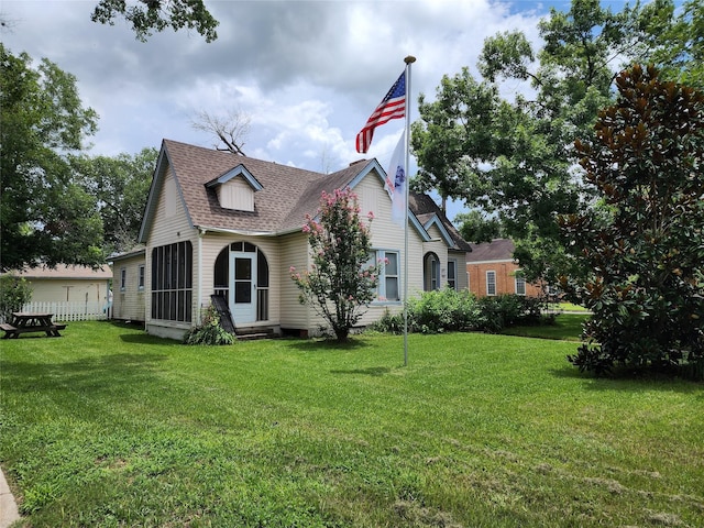 517 Church St, Navasota, TX 77868 - view of front facade with a front lawn, a shingled roof, and entry steps