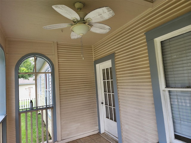 517 Church St, Navasota, TX 77868 - unfurnished sunroom featuring a ceiling fan