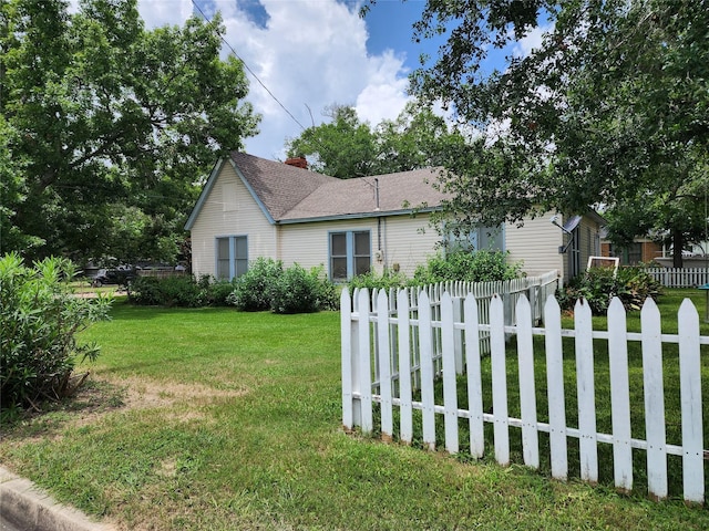 517 Church St, Navasota, TX 77868 - view of front of house featuring a chimney and roof with shingles