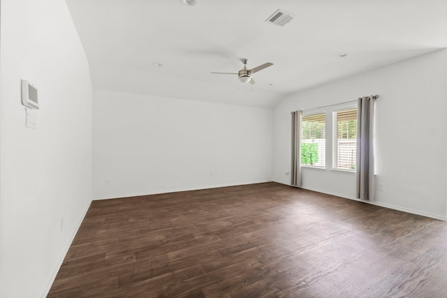 20213 Portbec Dr, New Caney, TX 77357 - spare room featuring ceiling fan, dark wood finished floors, and vaulted ceiling