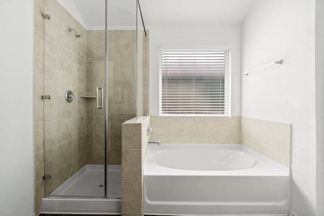 20213 Portbec Dr, New Caney, TX 77357 - bathroom with a bath and a stall shower
