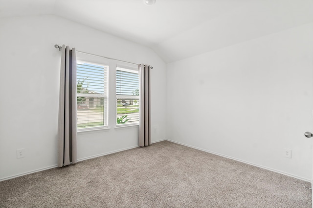 20213 Portbec Dr, New Caney, TX 77357 - unfurnished room featuring vaulted ceiling and carpet floors
