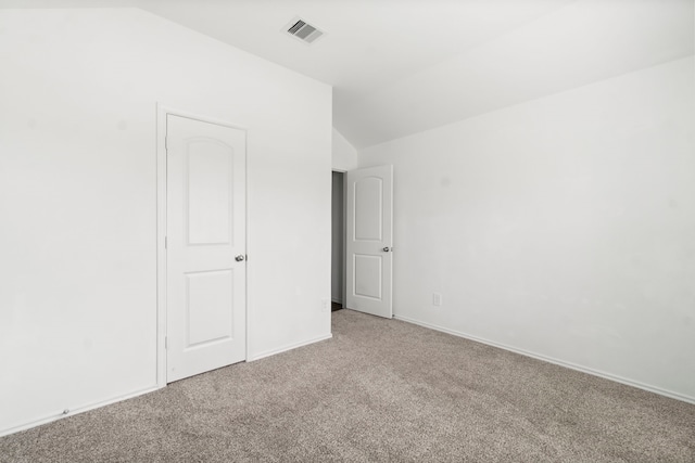 20213 Portbec Dr, New Caney, TX 77357 - unfurnished bedroom with carpet floors and vaulted ceiling