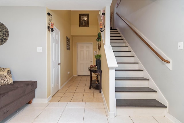 1526 Daffodil Rd, Missouri City, TX 77489 - staircase featuring tile patterned flooring and baseboards