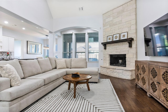 29110 Davenport Dr, Katy, TX 77494 - living area featuring dark wood-style floors, a fireplace, vaulted ceiling, and recessed lighting