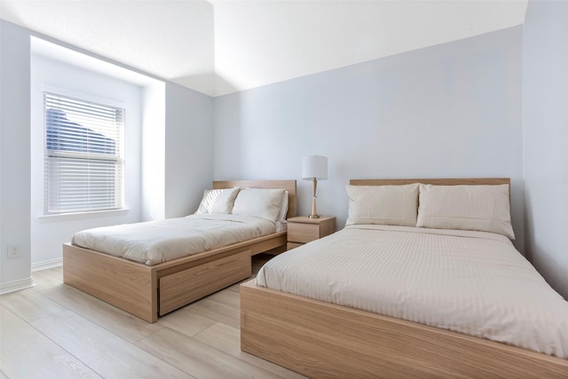 29110 Davenport Dr, Katy, TX 77494 - bedroom featuring baseboards and light wood-type flooring