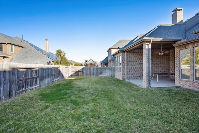 29110 Davenport Dr, Katy, TX 77494 - fenced backyard with a patio and a ceiling fan