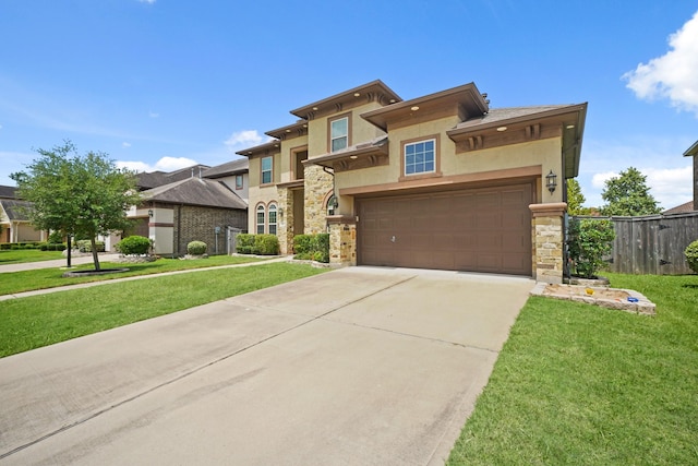 5706 Jenolan Ridge Ln, Sugar Land, TX 77479 - prairie-style home featuring stone siding, stucco siding, and concrete driveway
