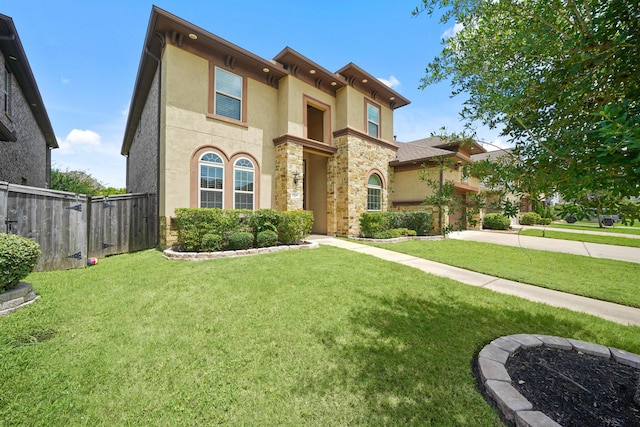 5706 Jenolan Ridge Ln, Sugar Land, TX 77479 - view of front of property with stone siding, stucco siding, and driveway
