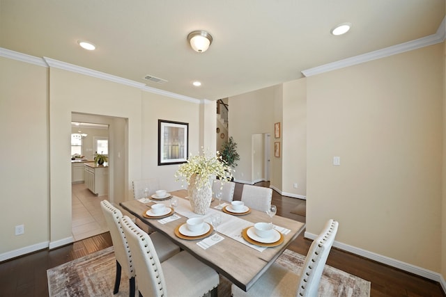 5706 Jenolan Ridge Ln, Sugar Land, TX 77479 - dining room with ornamental molding, wood finished floors, and recessed lighting