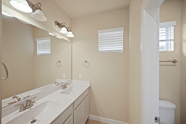 5706 Jenolan Ridge Ln, Sugar Land, TX 77479 - bathroom with double vanity and toilet