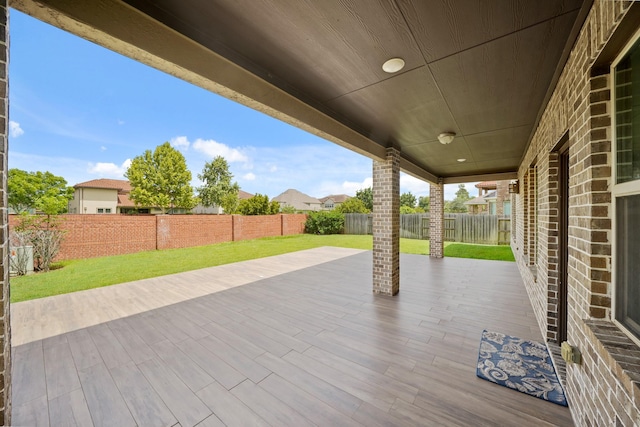 5706 Jenolan Ridge Ln, Sugar Land, TX 77479 - fenced backyard with a patio