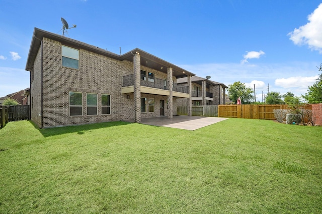 5706 Jenolan Ridge Ln, Sugar Land, TX 77479 - back of house featuring a balcony, a patio, brick siding, and a fenced backyard