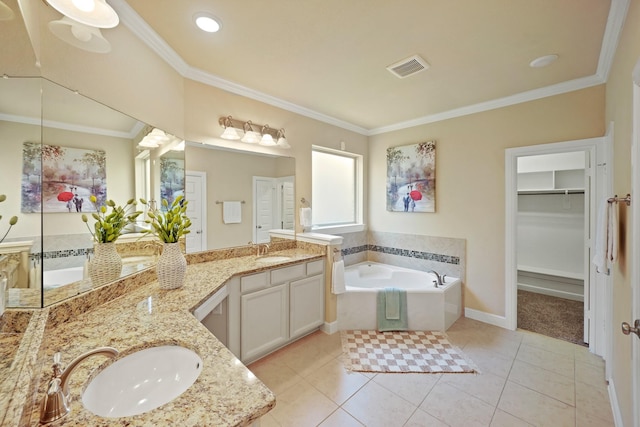 5706 Jenolan Ridge Ln, Sugar Land, TX 77479 - bathroom featuring vanity, a garden tub, crown molding, a spacious closet, and tile patterned flooring