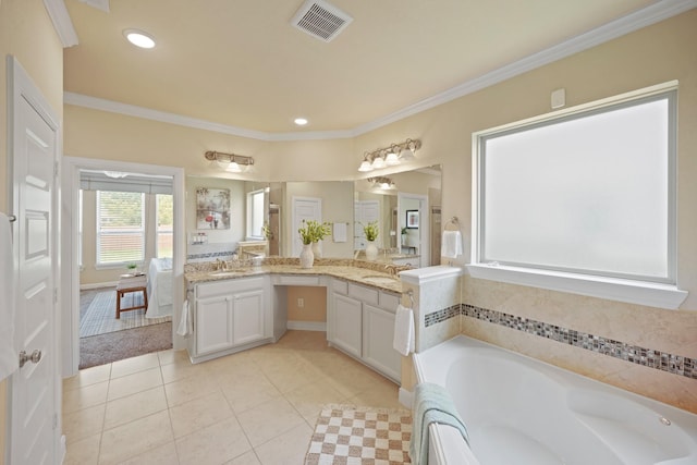 5706 Jenolan Ridge Ln, Sugar Land, TX 77479 - bathroom with a garden tub, vanity, ornamental molding, tile patterned flooring, and recessed lighting