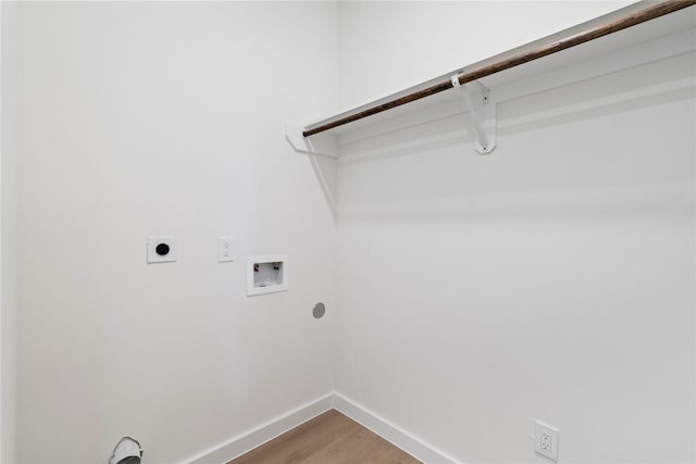 8022 Colonial Ln, Houston, TX 77051 - laundry room with electric dryer hookup, washer hookup, and wood finished floors