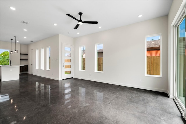 8022 Colonial Ln, Houston, TX 77051 - unfurnished living room with recessed lighting and ceiling fan
