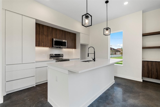 8022 Colonial Ln, Houston, TX 77051 - kitchen with stainless steel appliances, concrete floors, modern cabinets, white cabinets, and recessed lighting