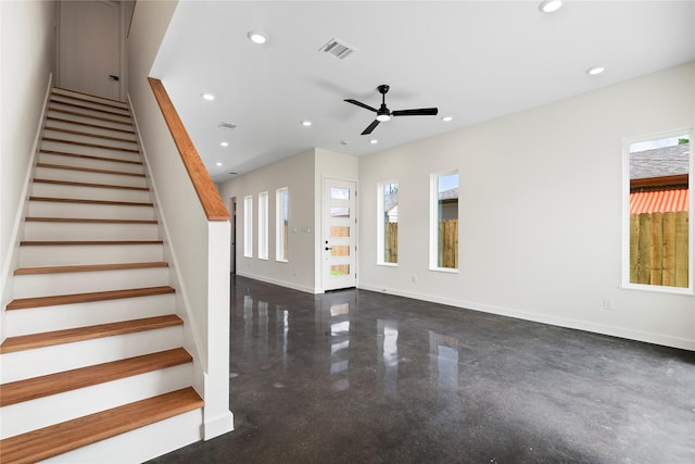 8022 Colonial Ln, Houston, TX 77051 - unfurnished living room with recessed lighting, stairway, and a ceiling fan