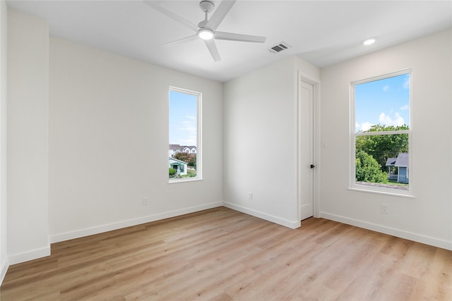 8022 Colonial Ln, Houston, TX 77051 - spare room with light wood-style flooring, ceiling fan, and recessed lighting