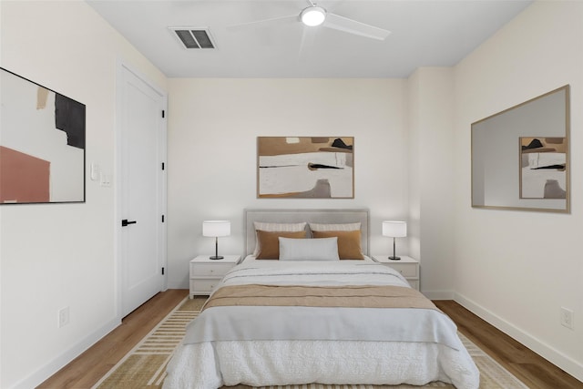 8022 Colonial Ln, Houston, TX 77051 - bedroom with wood finished floors and a ceiling fan