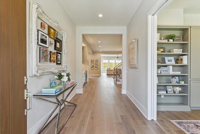 1710 Ebony Ln, Houston, TX 77018 - hall with light wood-type flooring, stairway, and recessed lighting