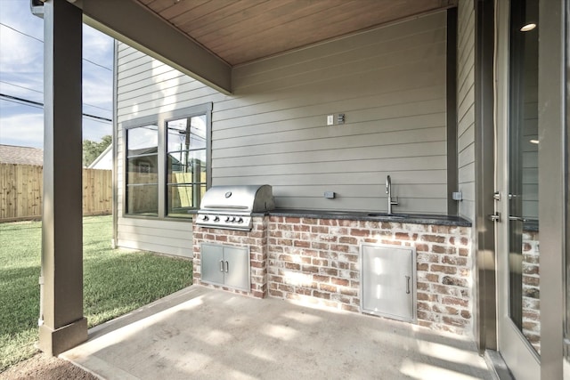 1710 Ebony Ln, Houston, TX 77018 - view of patio featuring an outdoor kitchen