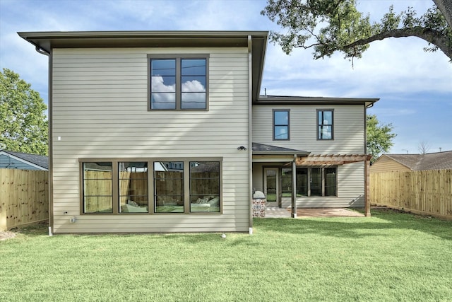 1710 Ebony Ln, Houston, TX 77018 - rear view of house with a fenced backyard and a patio