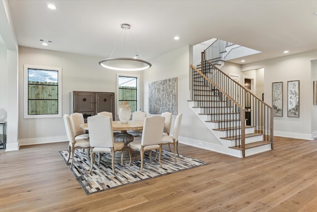 1710 Ebony Ln, Houston, TX 77018 - dining area with light wood-type flooring, stairs, and recessed lighting