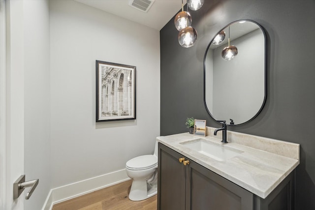 1710 Ebony Ln, Houston, TX 77018 - half bathroom with wood finished floors and vanity