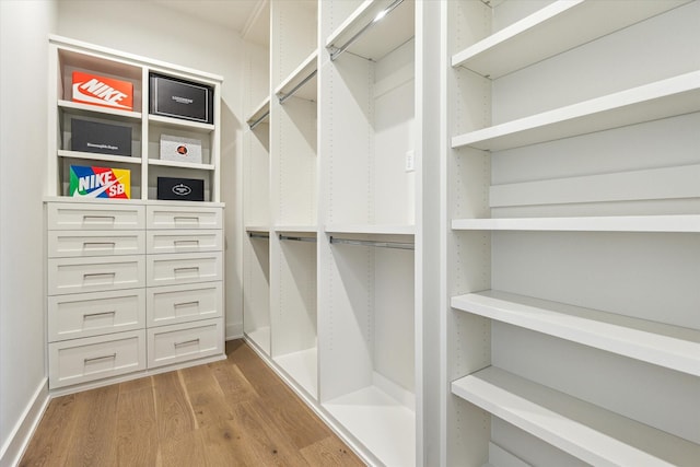1710 Ebony Ln, Houston, TX 77018 - walk in closet with wood finished floors
