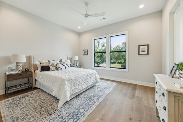 1710 Ebony Ln, Houston, TX 77018 - bedroom with light wood-style floors, recessed lighting, and a ceiling fan