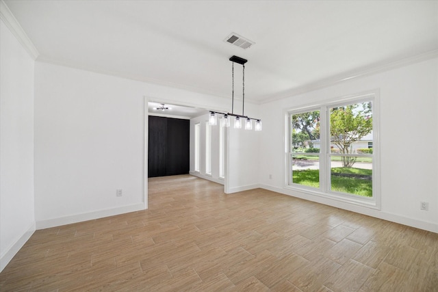 9711 Braewick Dr, Houston, TX 77096 - spare room with crown molding and light wood-type flooring