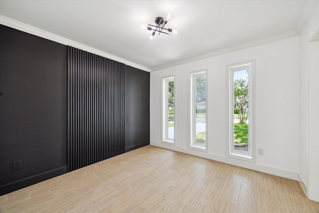 9711 Braewick Dr, Houston, TX 77096 - spare room featuring ornamental molding and wood finished floors