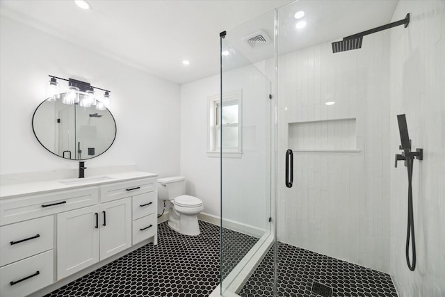 9711 Braewick Dr, Houston, TX 77096 - bathroom with a stall shower, vanity, recessed lighting, and tile patterned floors