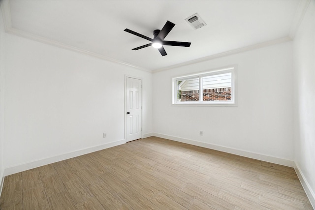 9711 Braewick Dr, Houston, TX 77096 - spare room featuring crown molding, ceiling fan, and light wood-style floors