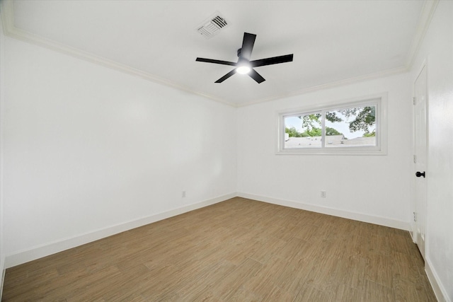 9711 Braewick Dr, Houston, TX 77096 - unfurnished room with ornamental molding, a ceiling fan, and light wood-style floors