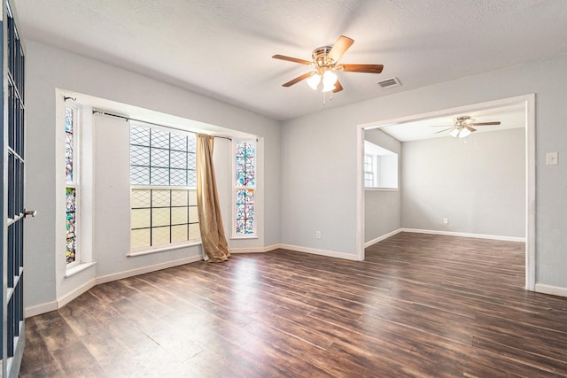 306 Hickory Ridge Dr, Shenandoah, TX 77381 - empty room featuring ceiling fan, wood finished floors, and a textured ceiling