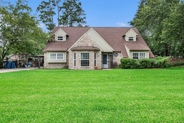 306 Hickory Ridge Dr, Shenandoah, TX 77381 - cape cod home featuring a front lawn, roof with shingles, and brick siding